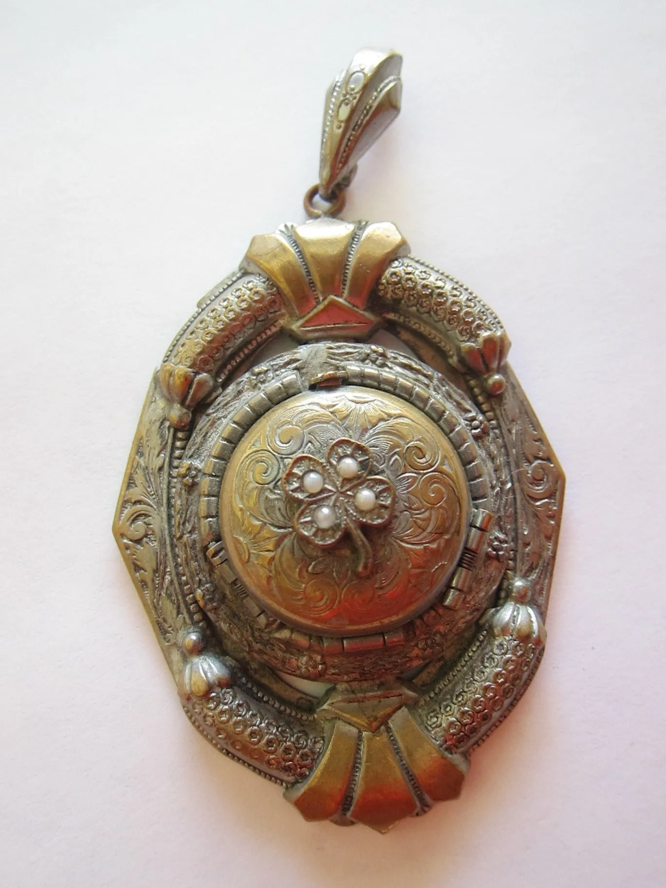 Antique Spring Loaded 4 Photo Locket