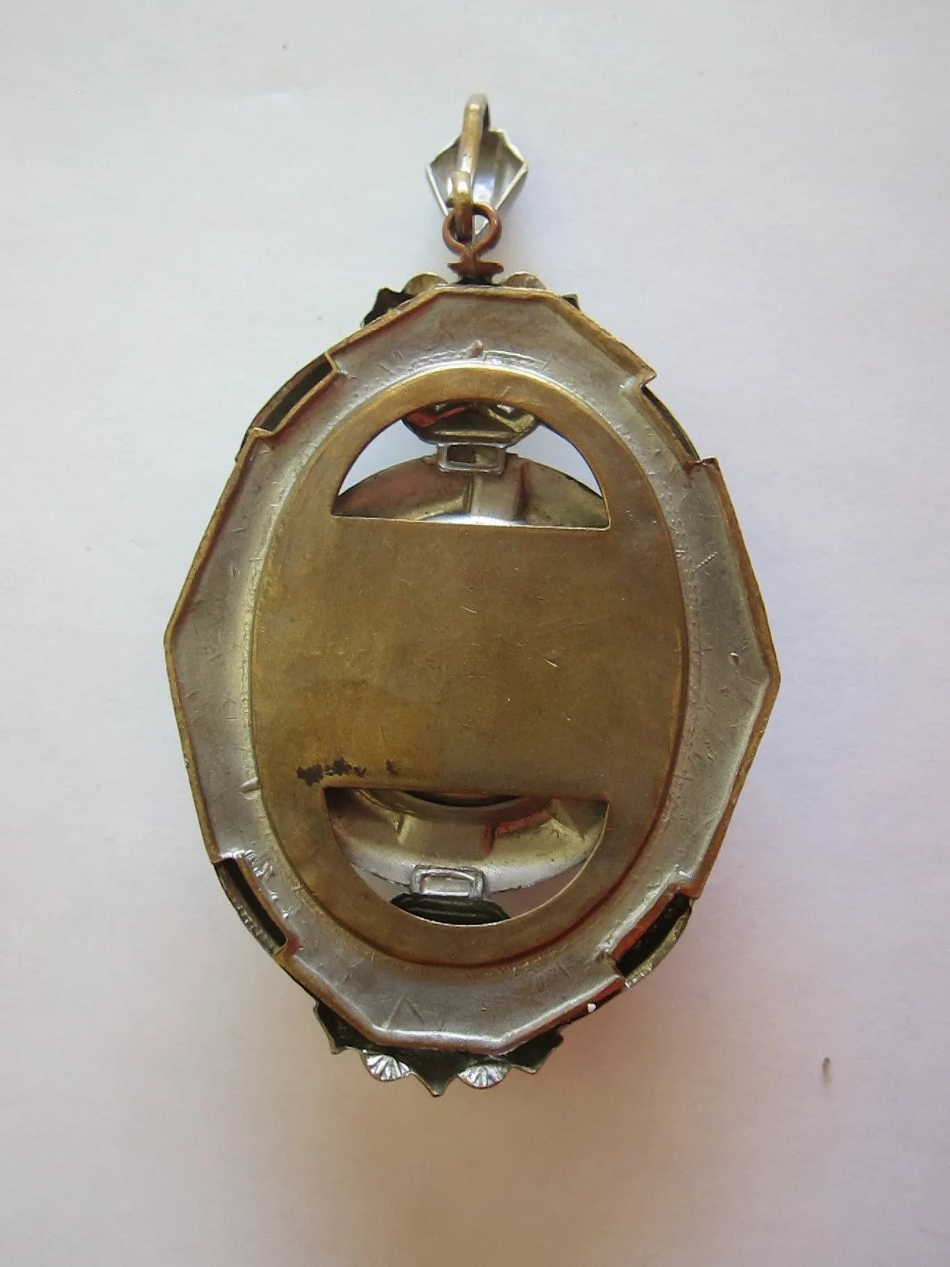 Antique Spring Loaded 4 Photo Locket