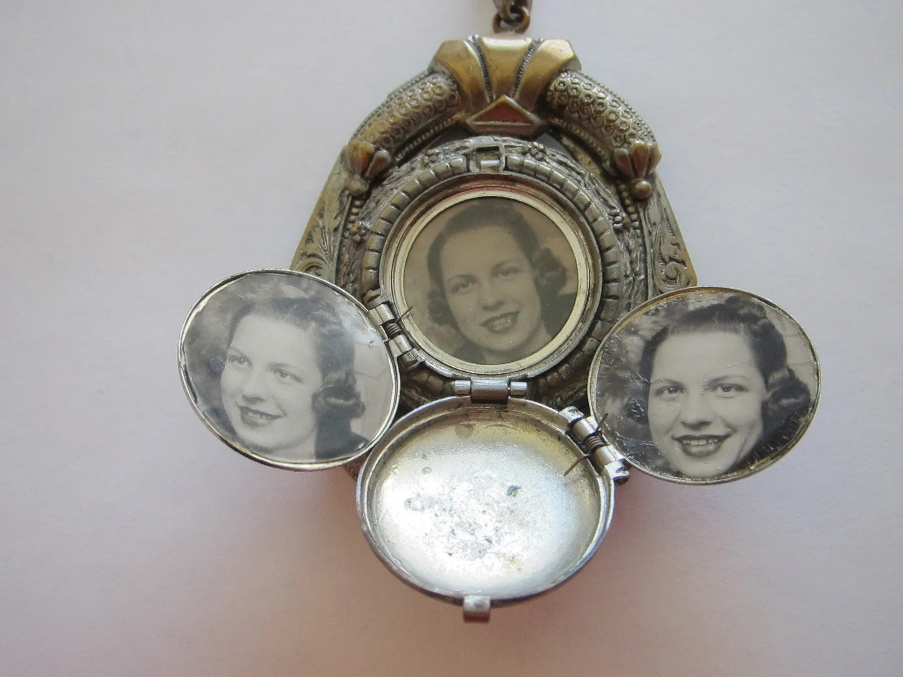 Antique Spring Loaded 4 Photo Locket